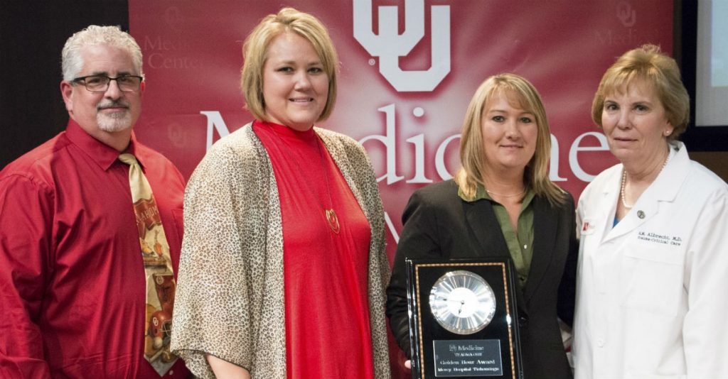 Mercy Hospital Tishomingo co-workers Steve Saltiel, Jennifer Imotichey and Ashley Smalling (pictured left to right with OU Medical Center's Dr. R.M. Albrecht) accepting the "Golden Hour" Award.
